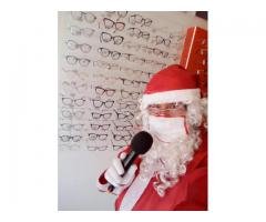 locutor de lojas fantasiado de papai Noel , papai Noel locutor em óticas
